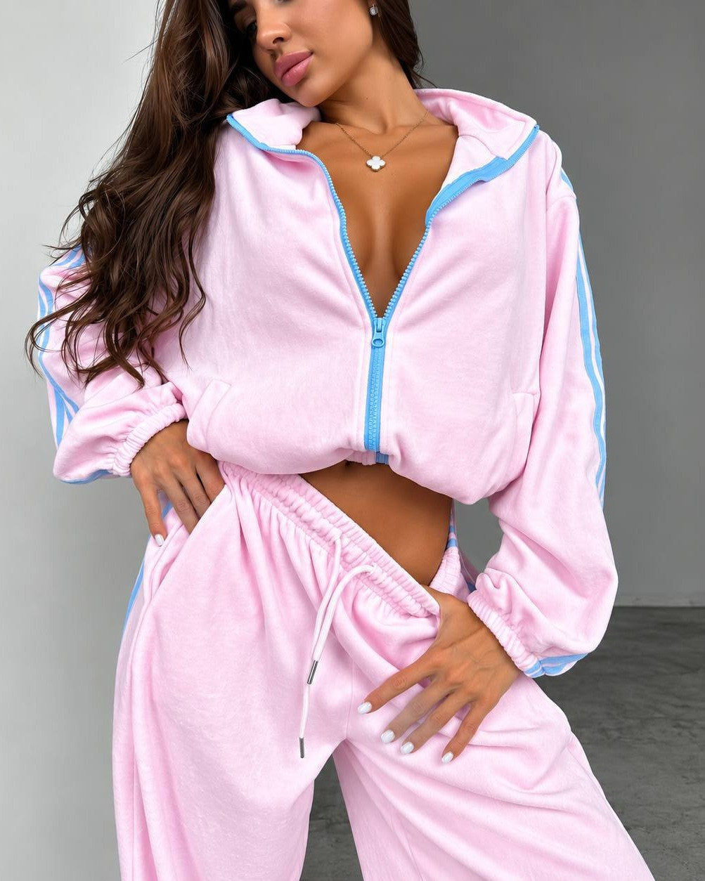 Pink velour tracksuit loungewear set, relaxed-fit hoodie and joggers, back view