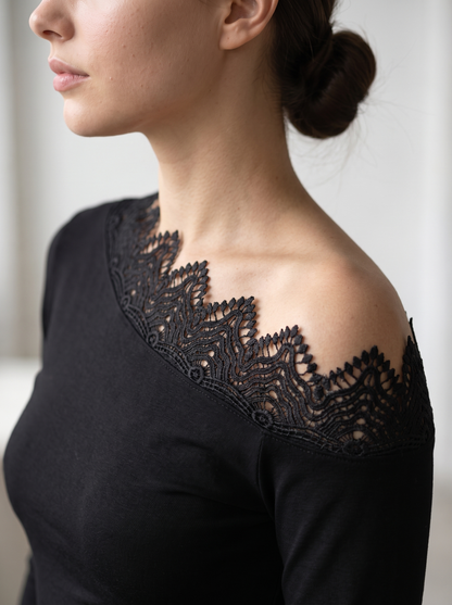 Blouse "Flow" black - asymmetric lace neckline close-up