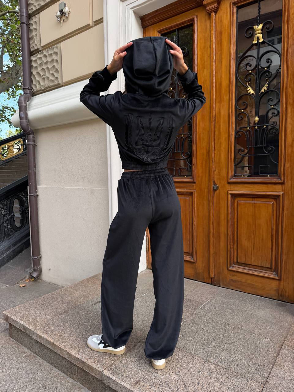 Black velour tracksuit with embroidered trident and wheat wreath, oversized loungewear set, front view