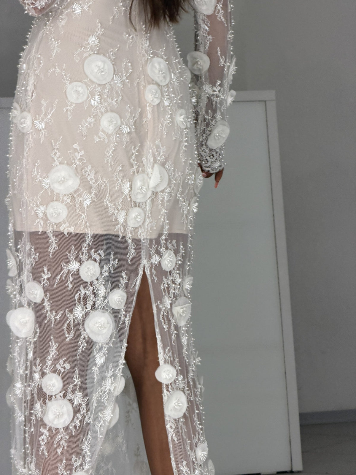 Close-up of Agata sheer lace skirt with 3D flowers and pearl embroidery