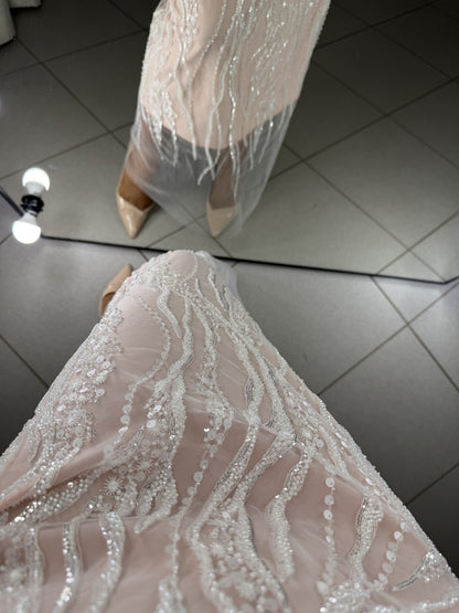 Close-up of Alba guipure with embroidery, sequins and beads on powder lining