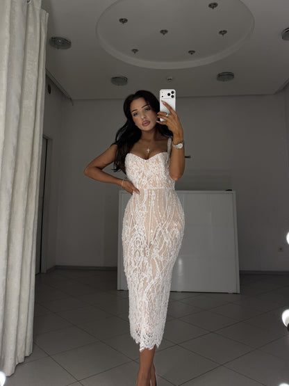 White pearl lace midi dress Arabella - front view, hand on hip, fitted silhouette