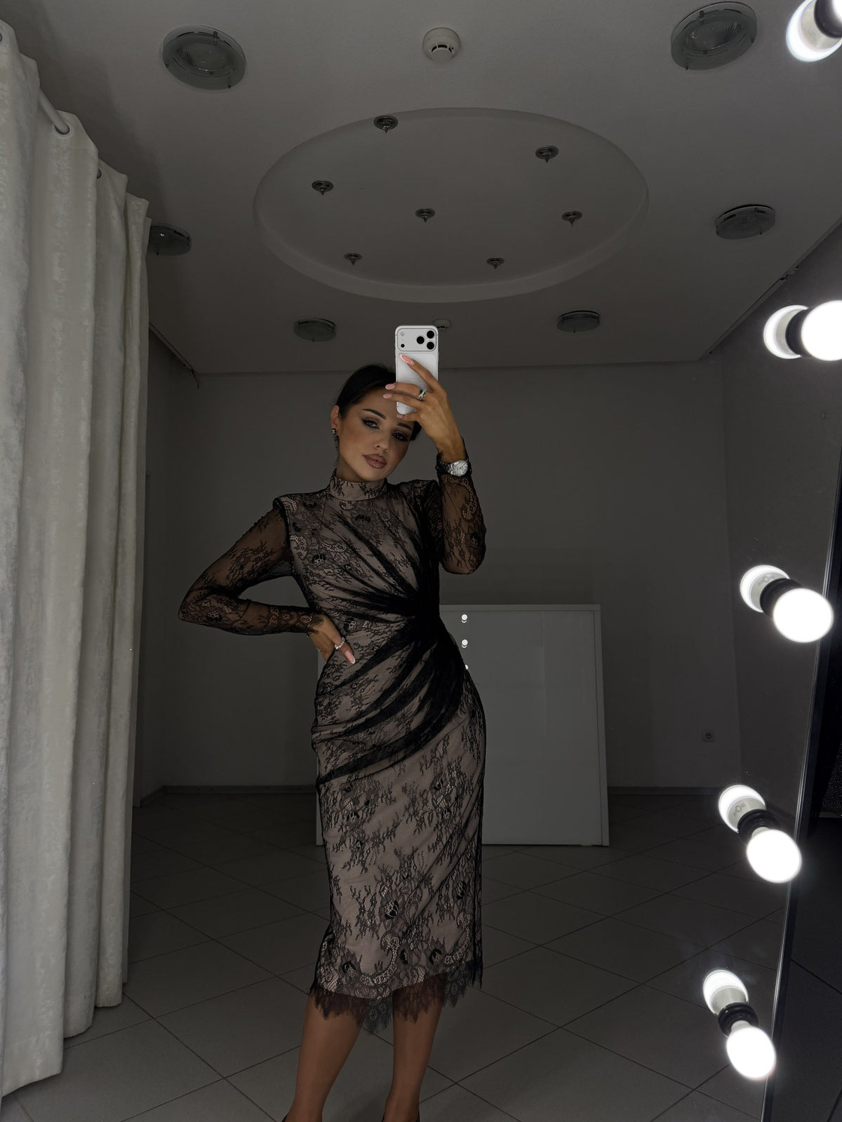 Midi dress with draping accenting the waist and scalloped lace hem
