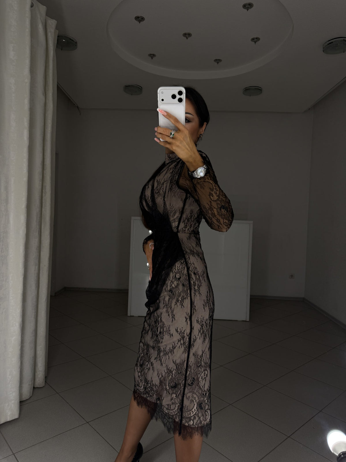 Carla lace dress with architectural draping - side view