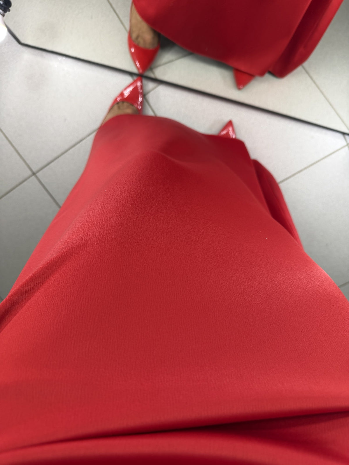 Premium matte red satin fabric of dress Carmen - close-up
