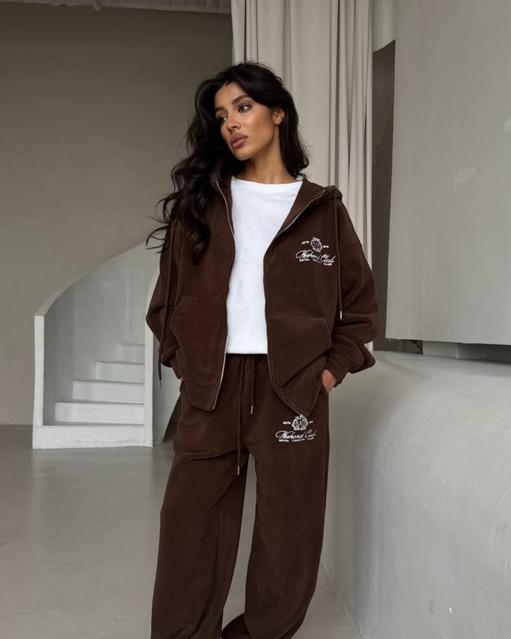 Chocolate brown women's fleece tracksuit with oversized zip hoodie and wide trousers, front view