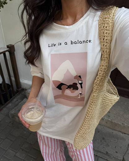 Marškinėliai „Life is a balance“ pieno spalvos