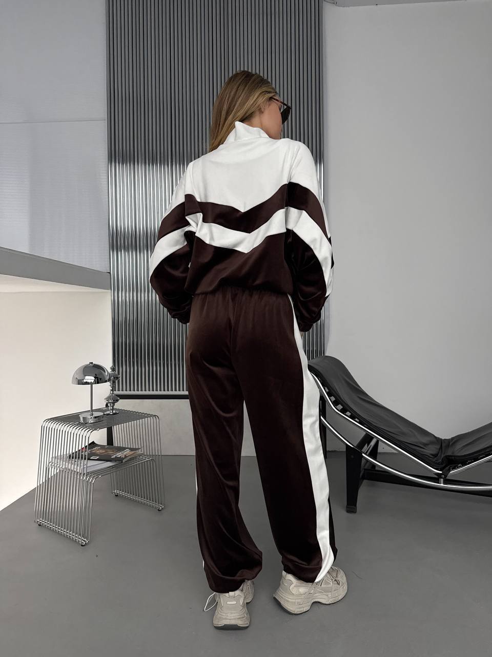 Chocolate brown and ivory colorblock velour tracksuit set, back view showing side stripe detail
