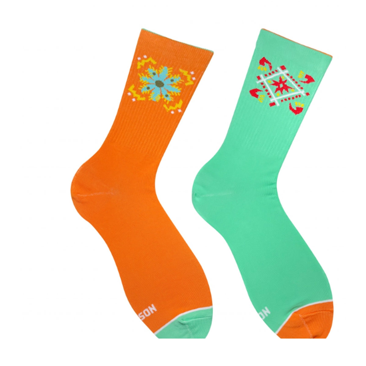 Orange and mint ornament socks - pair with flower and geometric folk motifs, front view