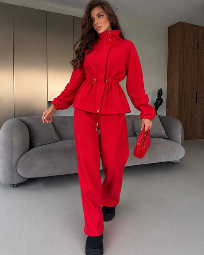 Red double-sided fleece tracksuit "FreeStyle" - model standing, jacket with high collar and drawstring waist, full-length front view