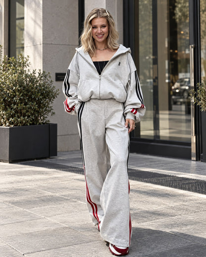 Light gray fleece-lined tracksuit with black and red stripes - front view