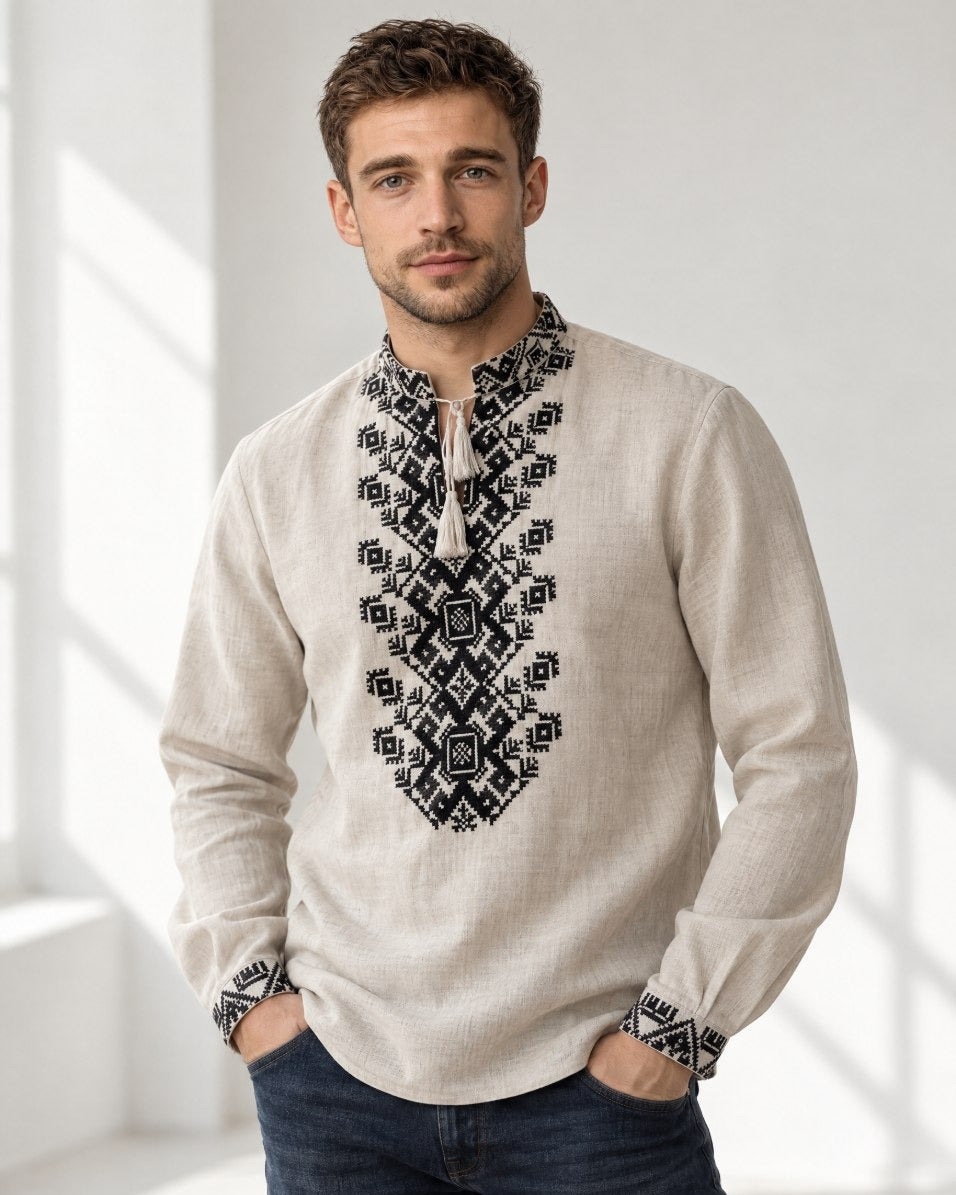 Men's natural linen vyshyvanka with black embroidery, front view, hands in pockets