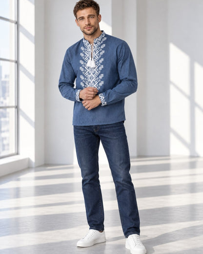 Men's blue linen vyshyvanka worn with dark jeans - full-length view