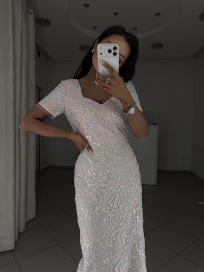 Linda fitted pink dress with dimensional embroidery - hand on hip pose, front view
