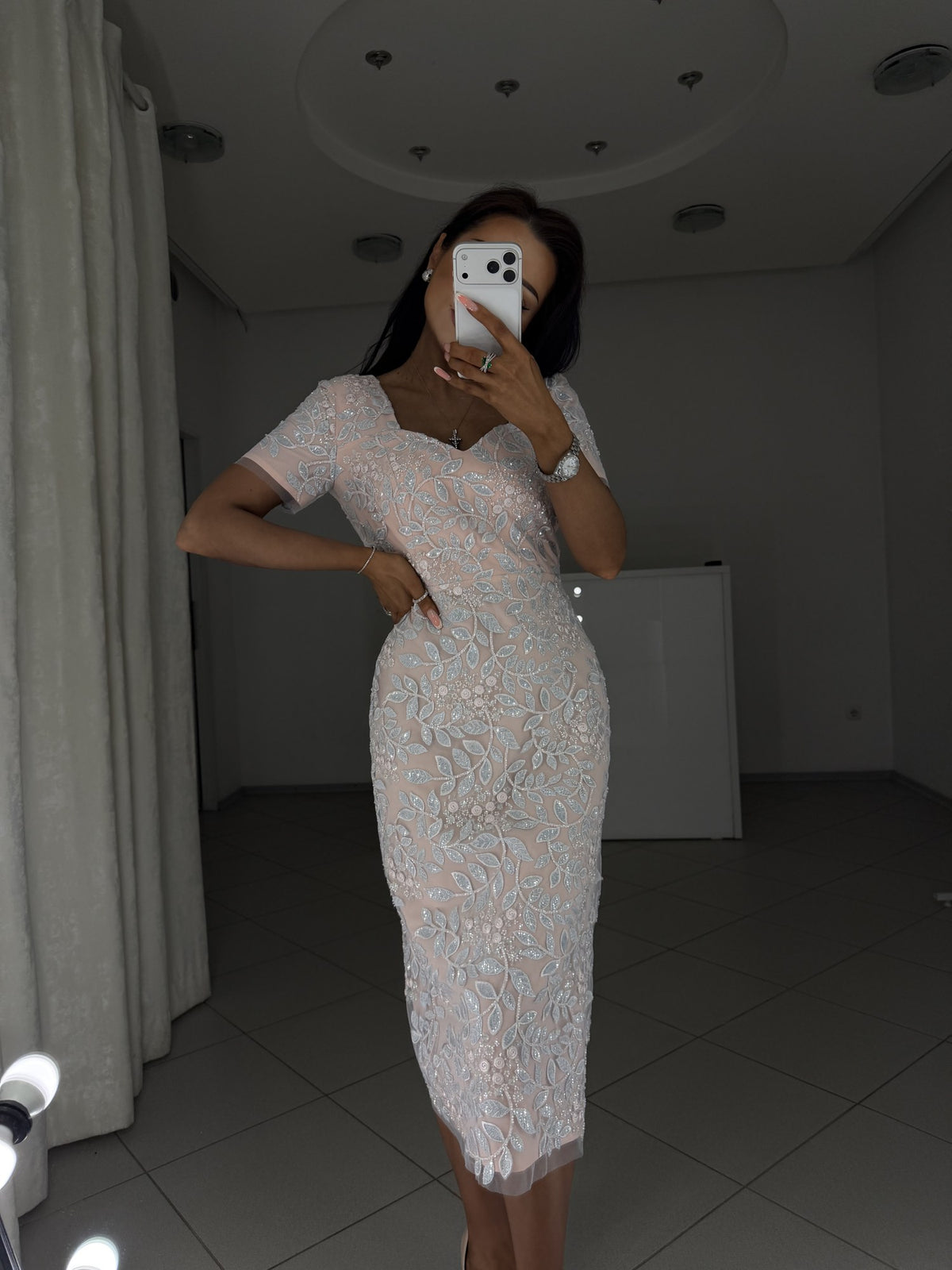 Linda midi dress in delicate pink shade - front view with studio mirror