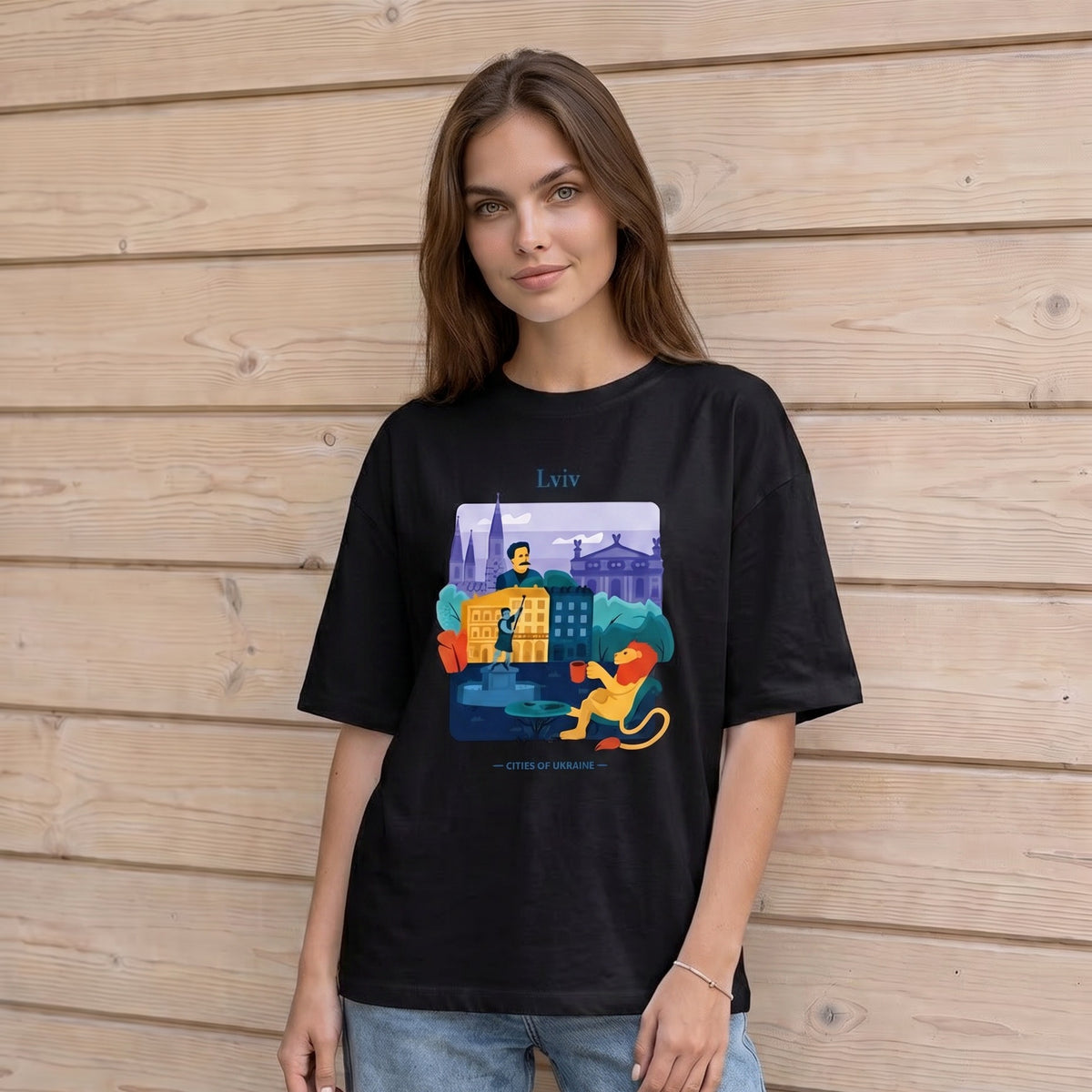 Black oversized cotton T-shirt with colorful Lviv city print, front view