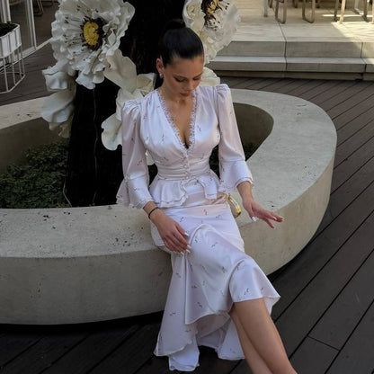 White satin blouse and skirt set with floral print, elegant occasion outfit