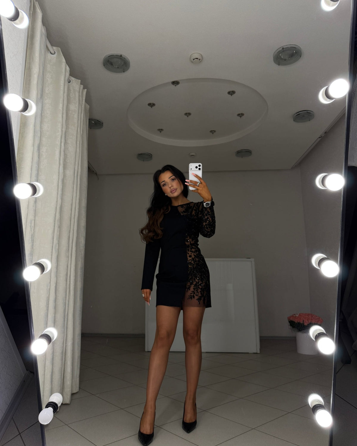 Black bandage knit mini dress with beaded sleeve, full-length view