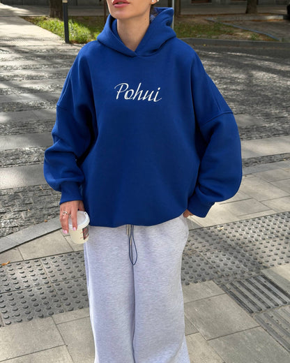 Blue hoodie with white embroidery, ribbed cuffs and a gathered hem - front view