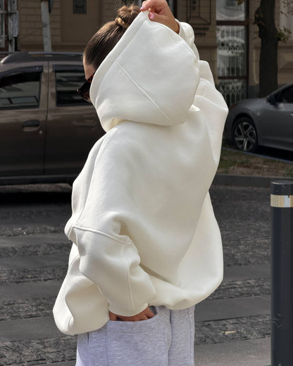 Milk-white hoodie with a roomy double-layer hood - close-up side view