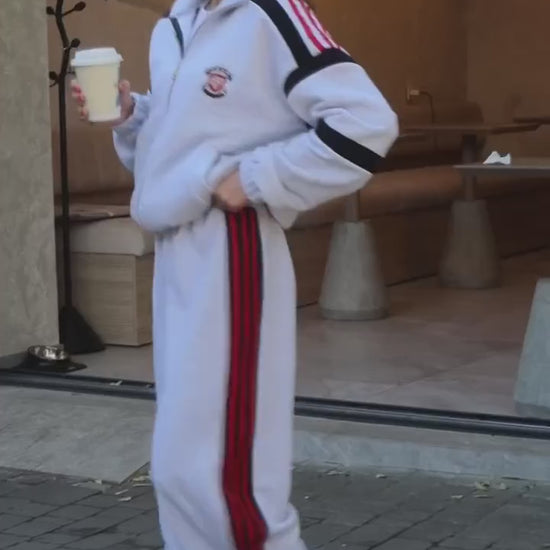 Gray melange tracksuit with red stripes - video
