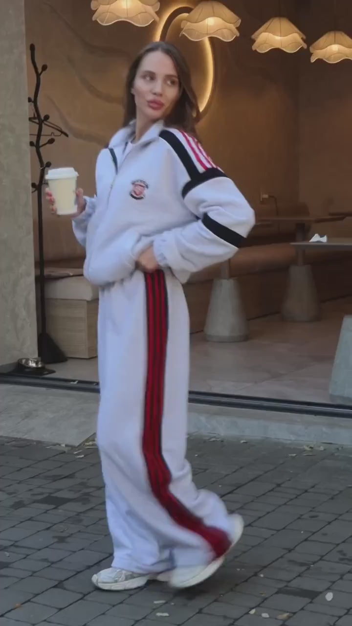 Gray melange tracksuit with red stripes - video