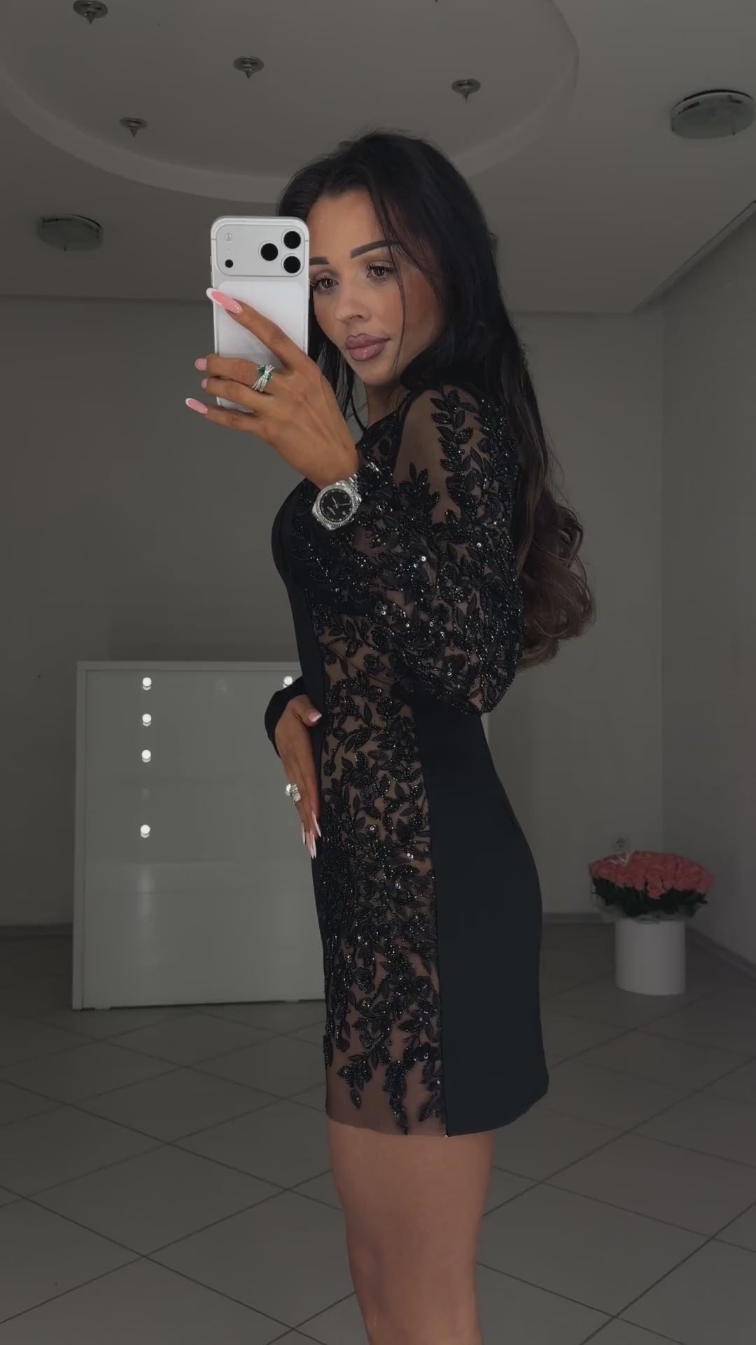 Black asymmetric mini dress with beaded embroidery on a sheer insert, video