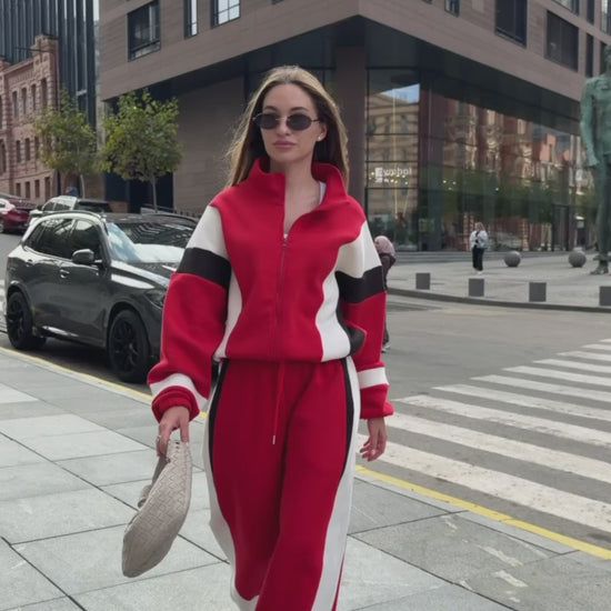 Styling video of the red tracksuit - zip jacket and wide-leg trousers