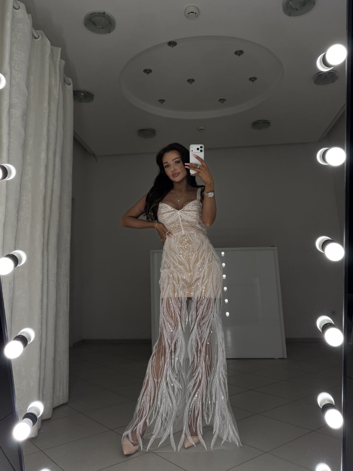 Luxury white evening dress with godet skirt and sheer embroidered hem - mirror view