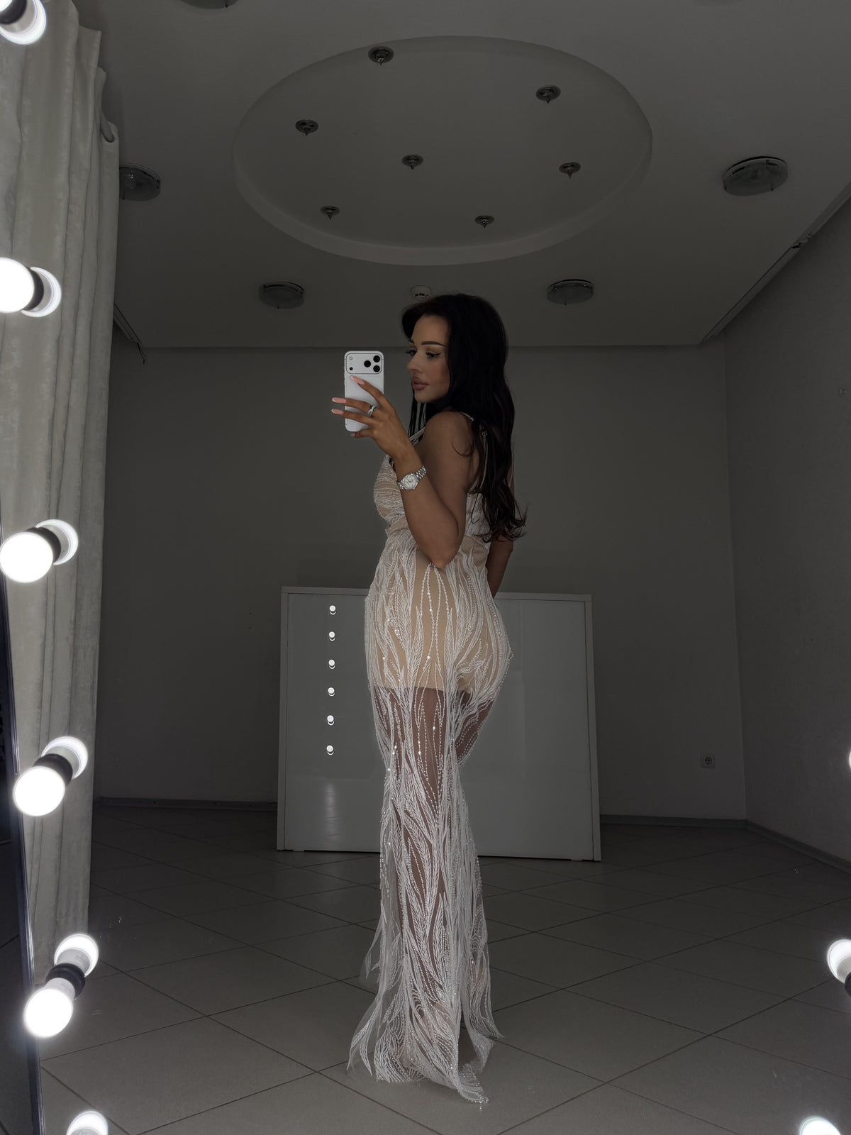 White beaded evening gown Royal - side view showing fitted silhouette and flowing godet skirt