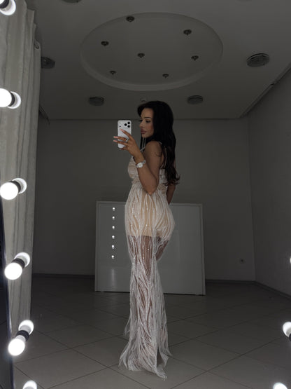 White beaded evening gown Royal - side view showing fitted silhouette and flowing godet skirt