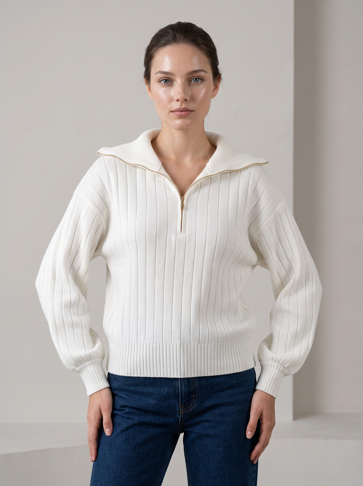 Woman wearing white ribbed knit half-zip sweatshirt, front view close-up on collar