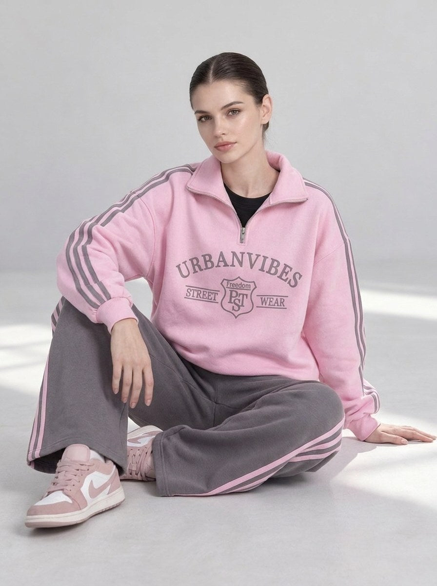 Tracksuit "Urban" in pink and gray - model sitting on the floor, front view