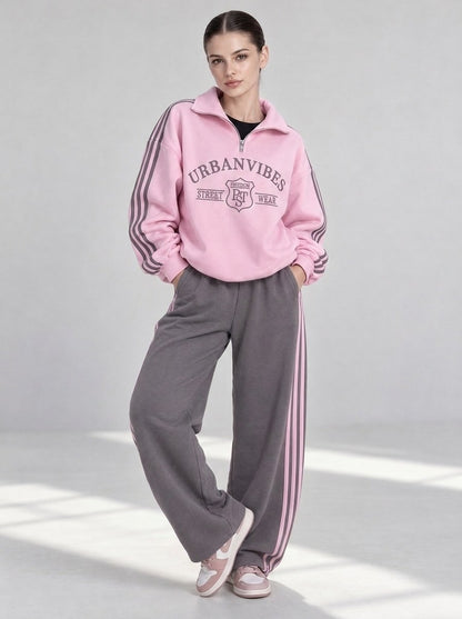 Pink sweatshirt with URBANVIBES print and gray wide-leg trousers, suit "Urban" - full-length view, hands in pockets