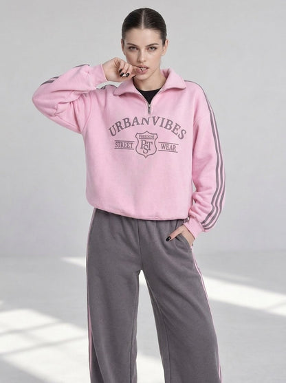 Pink half-zip sweatshirt "Urban" with contrast sleeve stripes and URBANVIBES print - close-up front view